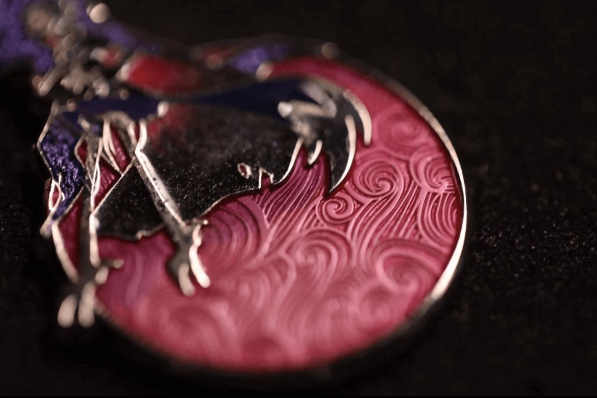 custom-anime-wizard-enamel-pin-closeup Hard enamel pin with anime wizard design, pink waves, and embedded glitter – an example of high-quality, limited-edition custom pins popular among collectors.