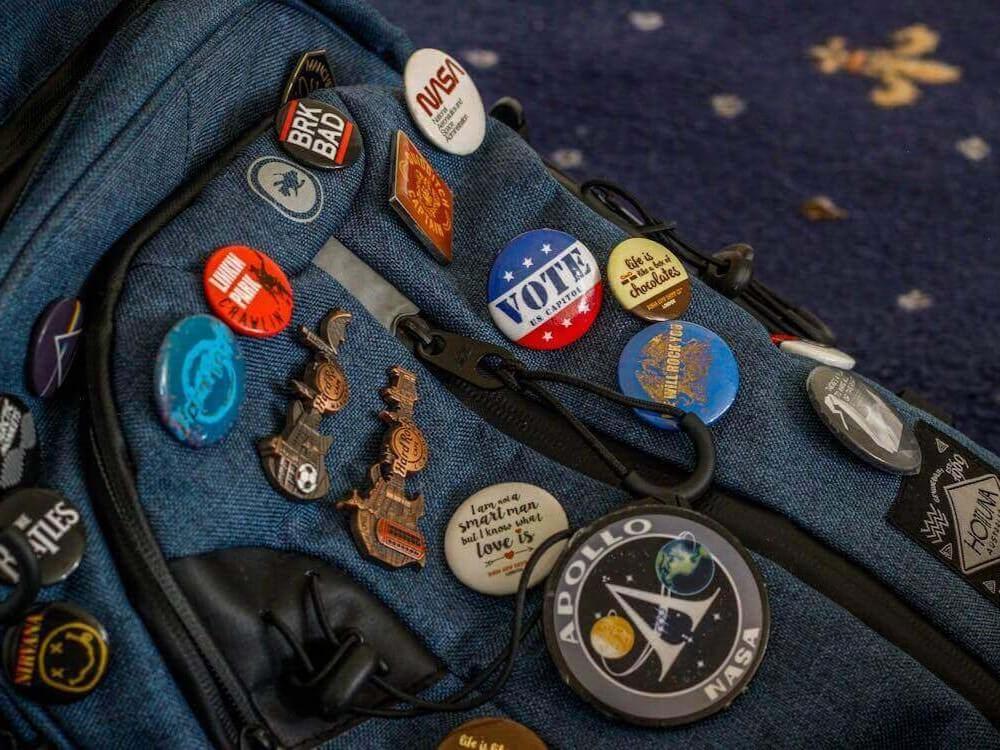 many pins on bagpack many pins on bagpack