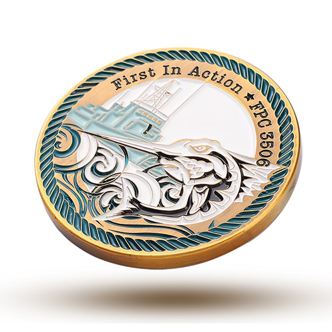 A detailed custom challenge coin showcasing the US Navy FPC 5509 Patrol Boat. The design combines the patrol boat imagery with a swordfish to symbolize strength and speed, along with waves to represent the sea. The coin features a gold rim, blue and white color scheme, and is decorated with nautical textures, making it an ideal collectible for military personnel and naval enthusiasts.