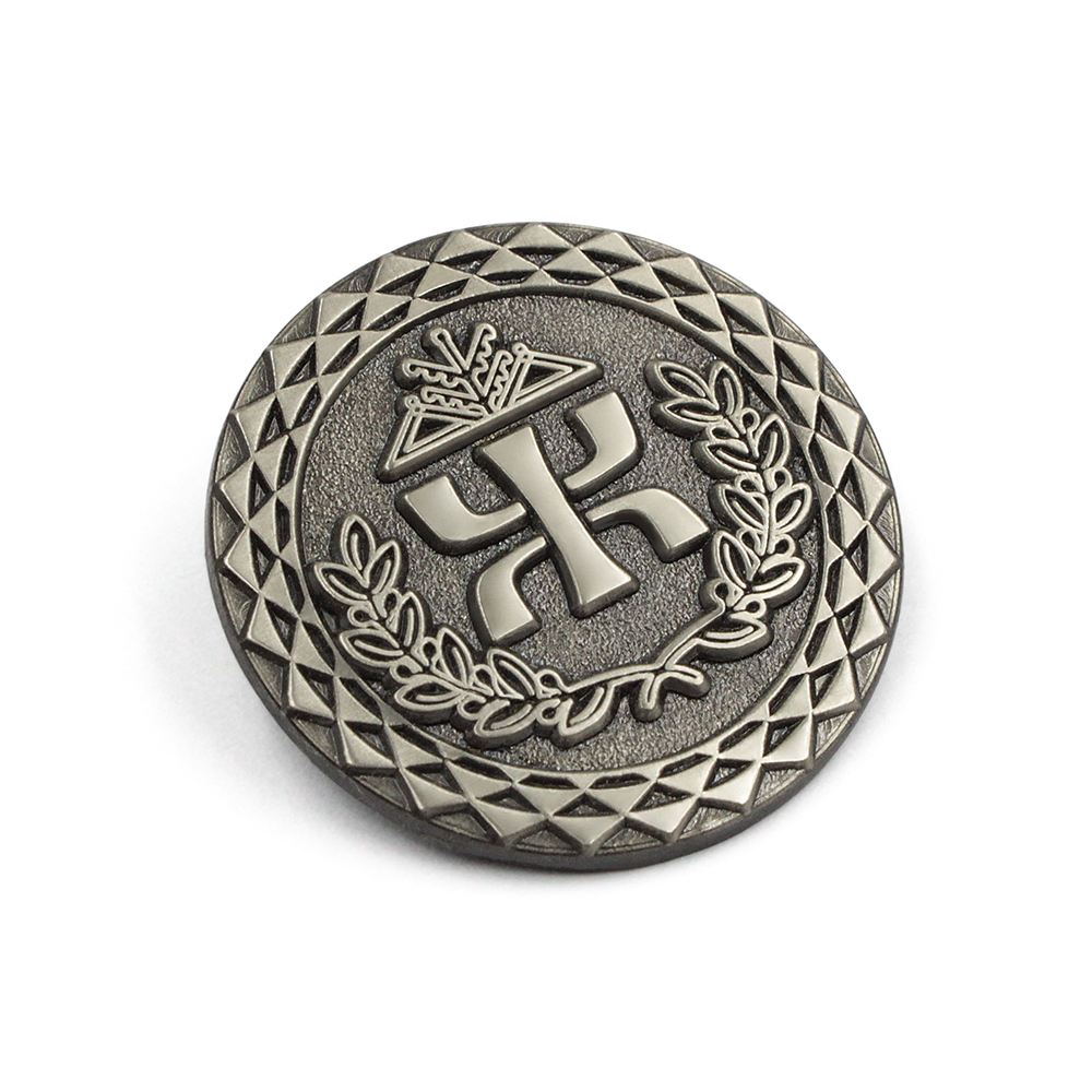 Side view of custom 3D lapel pin showing depth of Triple Tau emblem in antique silver finish