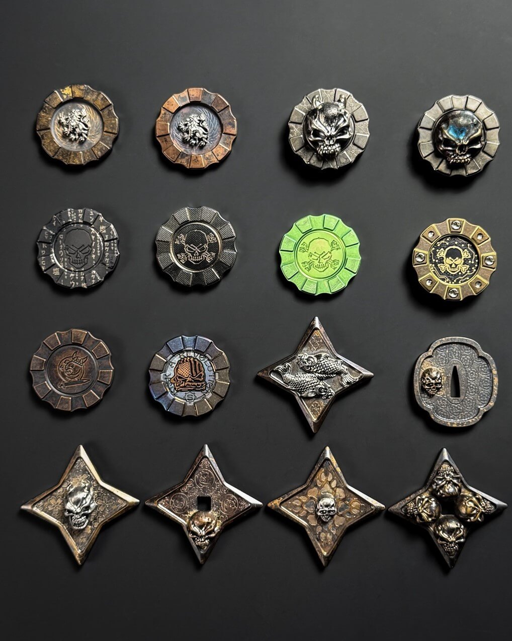 Collection of custom metal challenge coins with skull and fantasy themes