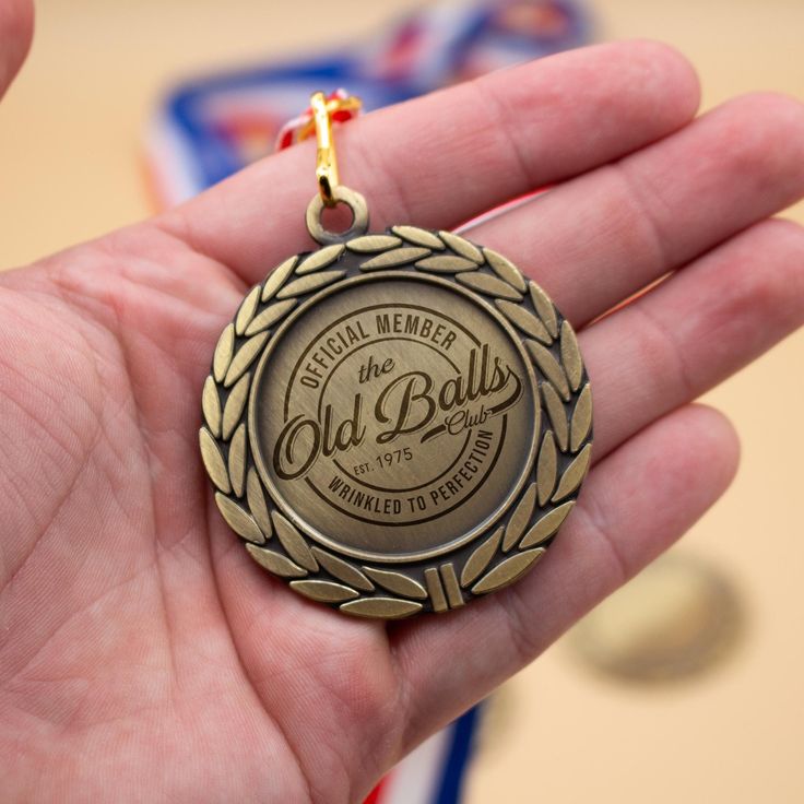 Bronze-toned vintage medal engraved with "Official Member the Old Balls Club est.1975 Wrinkled to Perfection" – perfect funny gift for male friends or club initiation ceremonies