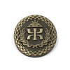 Custom 3D lapel pin featuring Triple Tau emblem in antique bronze finish with geometric border and laurel