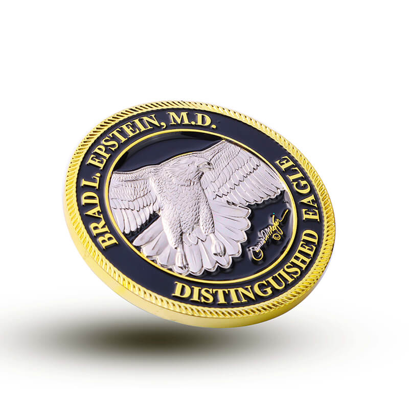 A personalized eagle challenge coin designed as a distinguished honor award for medical professionals. This custom coin showcases a silver bald eagle in high-relief detail, gold-plated border, engraved name “BRAD L. EPSTEIN, M.D.” and a signature-style mark, representing a premium custom challenge coin for recognizing individual excellence and lifetime achievement.