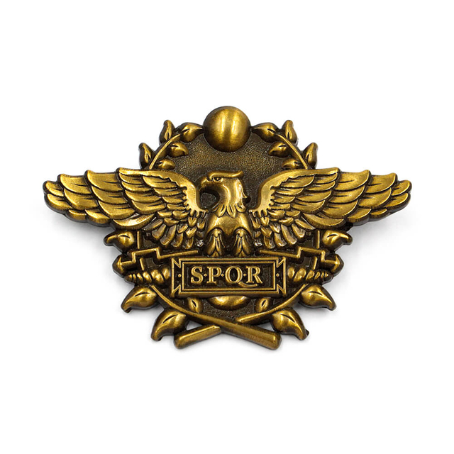 Antiqued gold die cut metal eagle pin with detailed wings