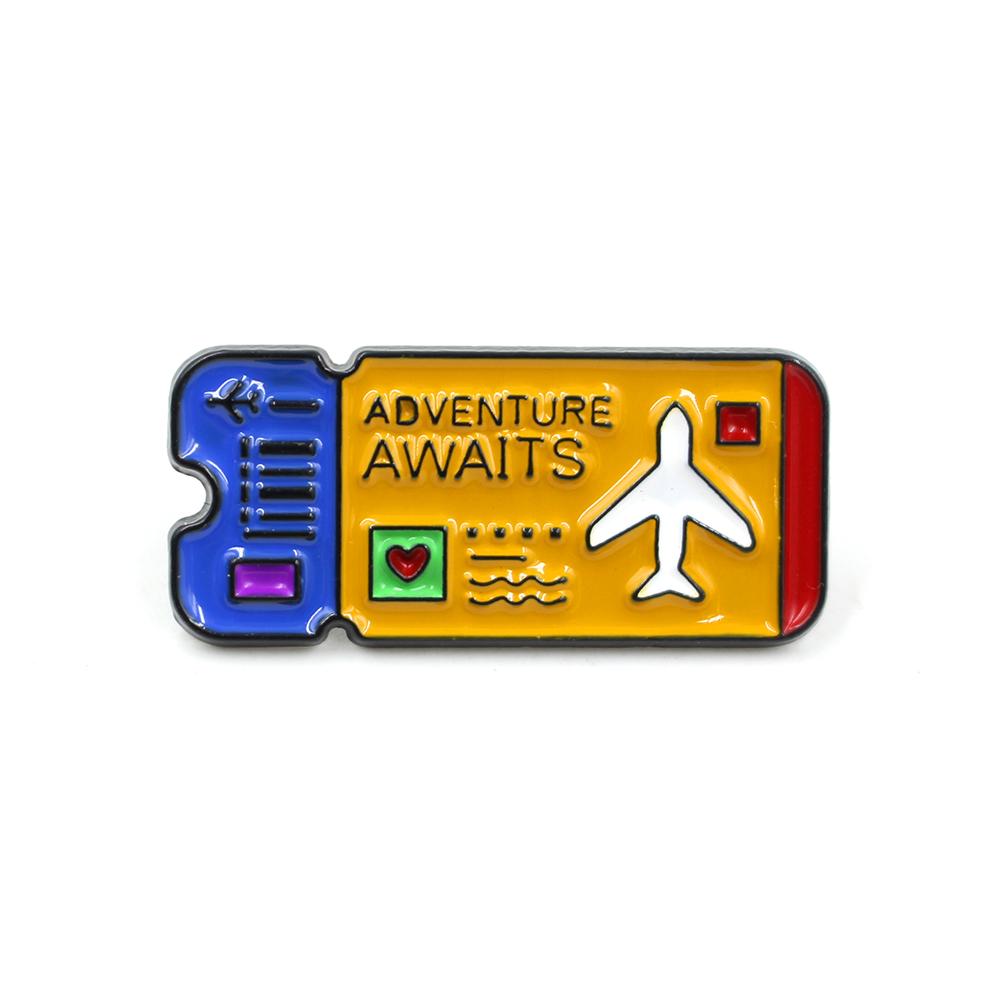 Hard enamel lapel pin designed as a boarding pass with “Adventure Awaits” text, travel themed enamel pins ideal for personalised lapel pin and custom souvenir collections