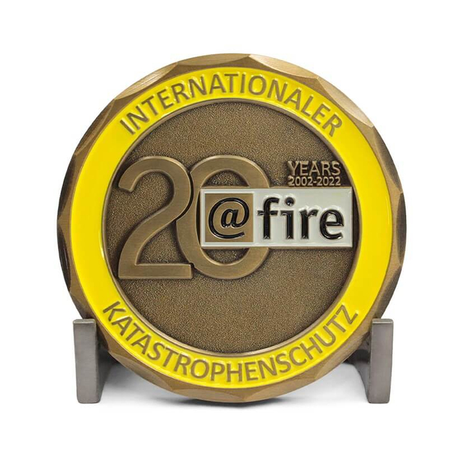 Custom coins from metal challenge coin manufacturers - unique 3D soft enamel anniversary style on stand