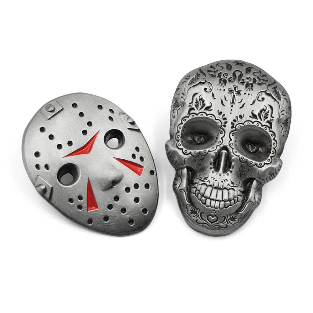Two styles of custom die cut pins: a weathered silver Jason hockey mask with red enamel triangles and a vintage sugar skull. Both feature high-quality metal craftsmanship and antique finishing.