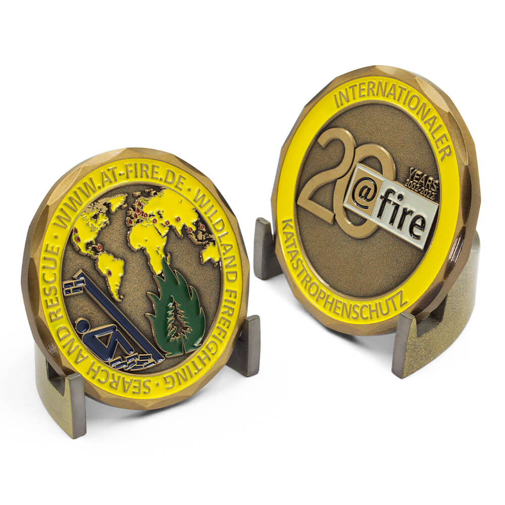 Unique challenge coins in 3D custom soft enamel - anniversary and wildfire rescue themes with yellow edges