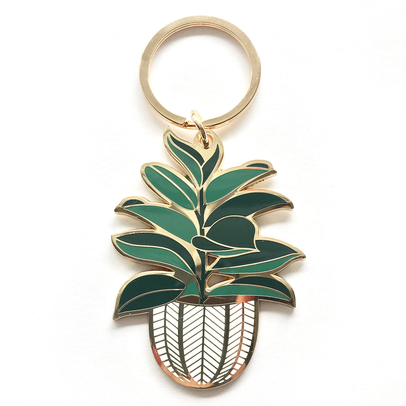 Gold-rimmed enamel keychain featuring a lush green houseplant in a woven basket pot