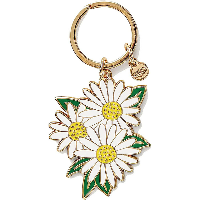 Enamel keychain with cluster of three white daisies and green leaves
