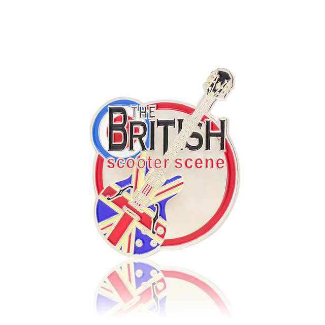 Custom hard enamel pins collection featuring guitar, keyboard, microphone, drum, and British rock designs with vibrant colors and polished gold plating for music fans and collectors.