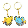 CUGLE kawaii anime keychain duo: yellow and blue Shinx-inspired characters holding stars, gold chain enamel