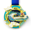 GUGLE custom race medal featuring dragon boat paddler on ocean waves, 3D colorful enamel, turquoise blue gold finish and blue ribbon for racing finishers