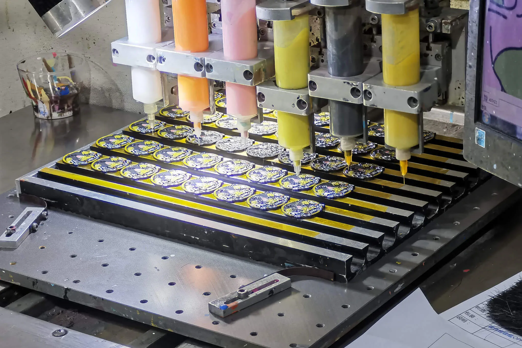 The machine fills and colors the product.