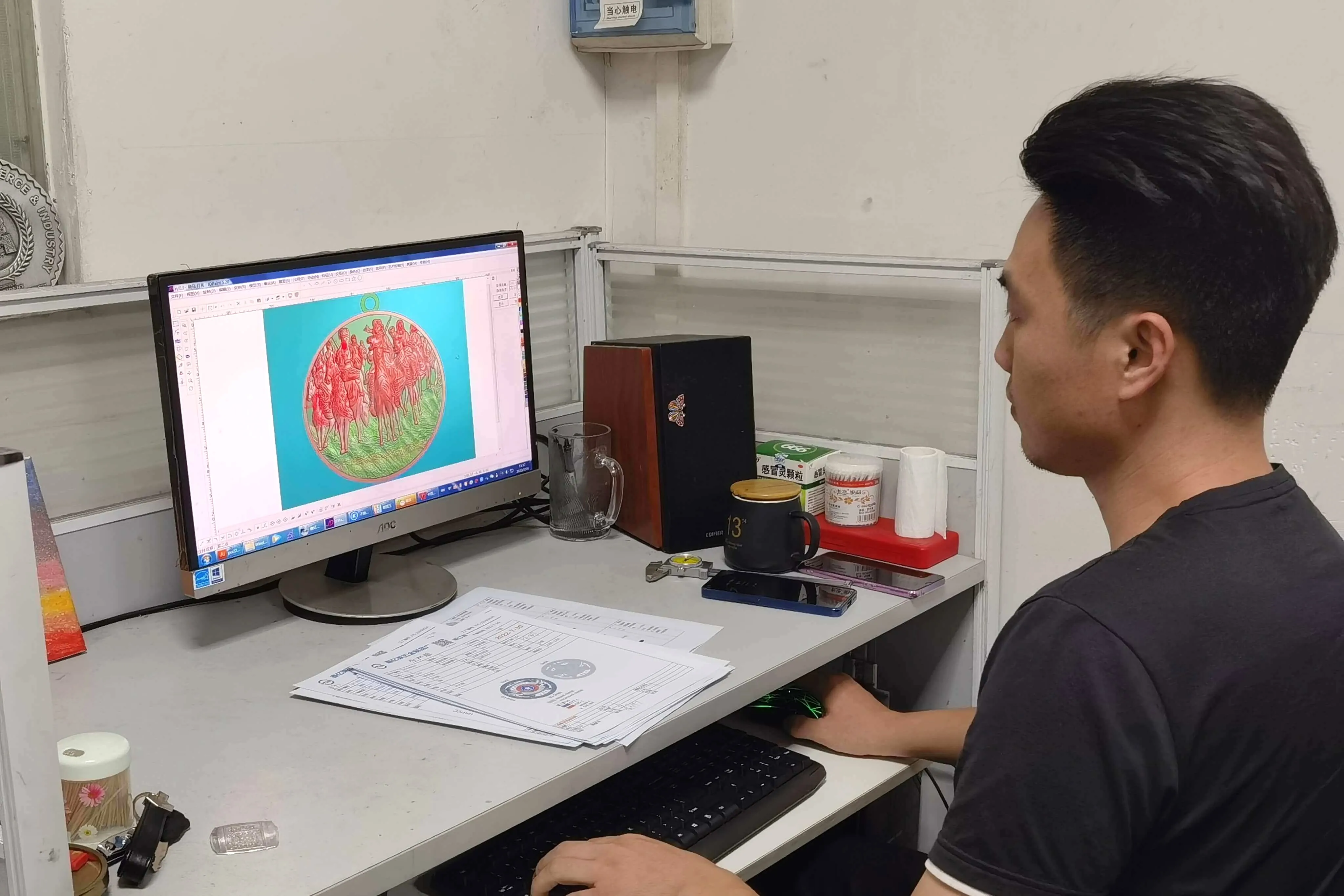 esigners at the Cugle factory are designing and reviewing the artwork